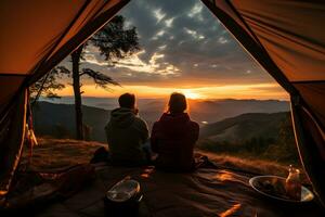A young couple of hikers sitting and enjoying beautiful view together on sunset or sunrise. Camping, travel, holiday concept. Ai generative photo
