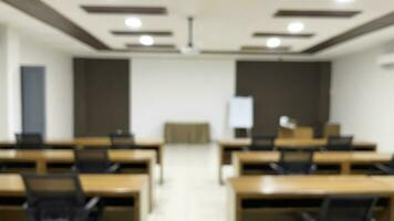 Blurred image of meeting room in the modern office, ideal for presentation background photo