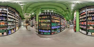 full hdri 360 panoramain in interior of wine shop with shelves of alcoholic drinks in equirectangular projection, VR content photo