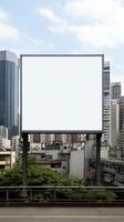 Blank billboard frame nestled amidst a bustling urban landscape, open canvas for creativity photo