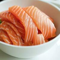salmón sashimi poner dentro blanco cuencosalmón sashimi poner dentro blanco bol. ai generativo foto