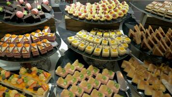 Buffet table with desserts in hotel video