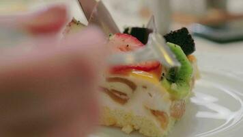 A closeup of a beautiful cake decorated with fruits and chocolate video