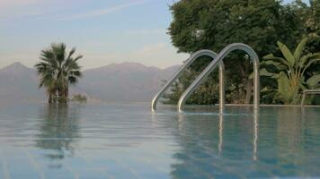 Summer resort scene with swimming pool video