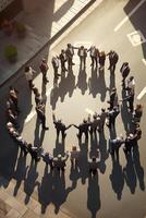 Bird's eye view of business professionals forming a circle in a city intersection photo
