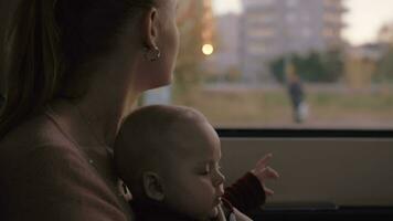 Car journey of mother with lovely baby daughter video