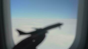 Plane model against clouds and sky in illuminator video