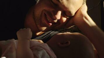 Happy dad with baby who starts crying video