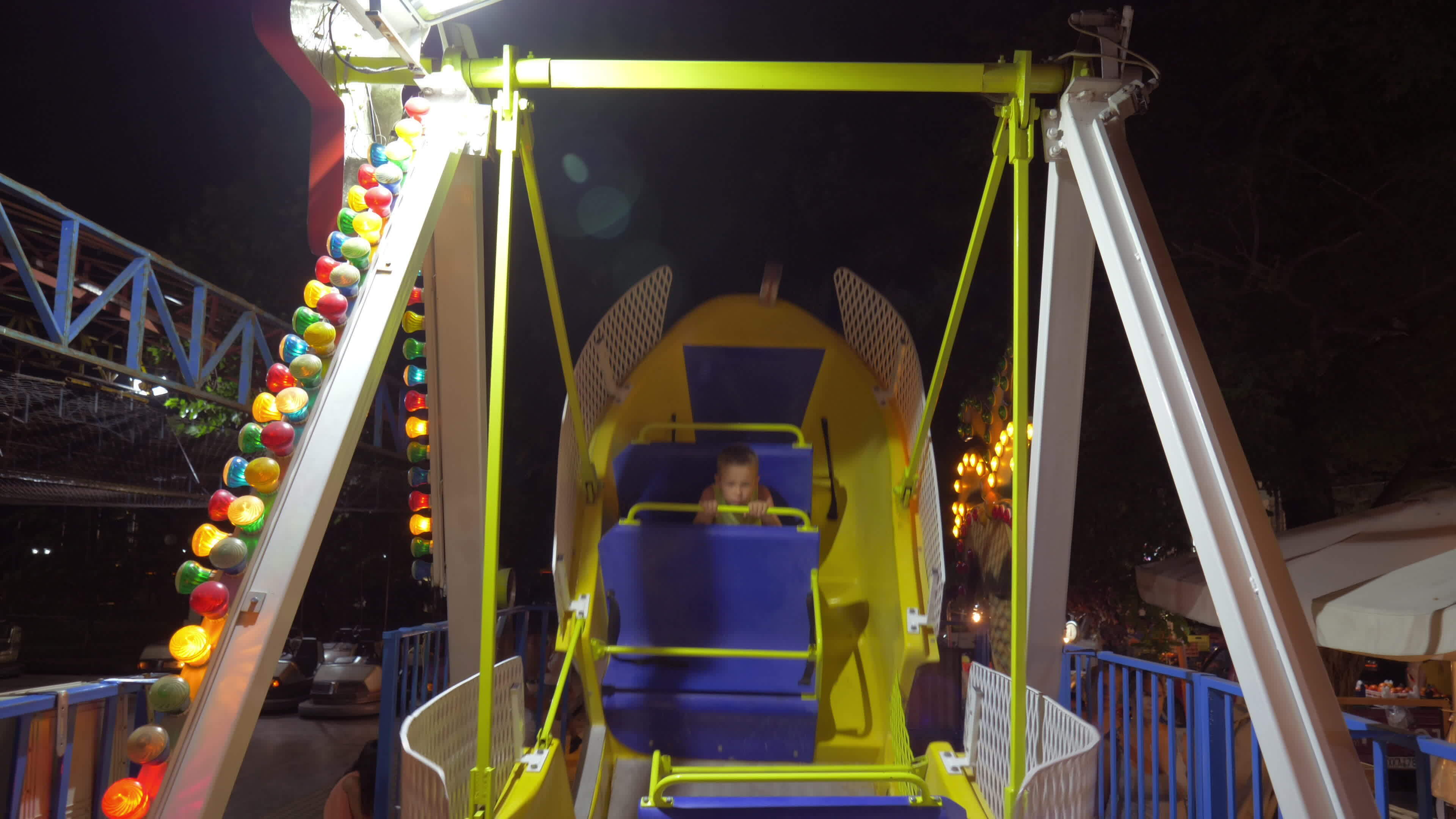 child-having-pirate-boat-ride-in-amusement-park-28773996-stock-video-at