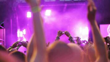 Audience greeting favourite musicians at the concert video