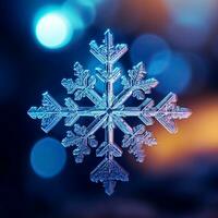 Beautiful snowflake on a blue background with bokeh. photo