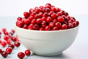 Close-up of fresh cranberries in a white bowl. Bright natural light, red berries as sole point of interest. Crisp and minimalist. AI Generated. photo