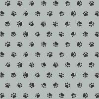 Vector seamless pattern with paw print on gray background. animal print vector illustration