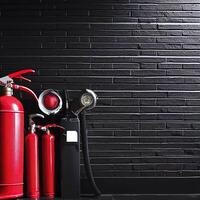 fire extinguish equipment with black brick wall. AI Generative photo