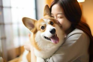 portrait of woman hugging cute corgi dog. pet concept photo