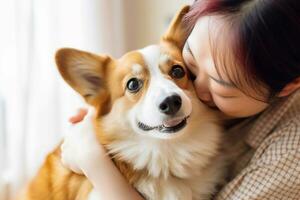 portrait of woman hugging cute corgi dog. pet concept photo