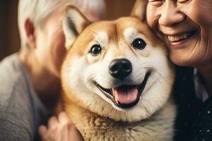 portrait of man and woman hugging cute shiba inu dog. pet concept photo