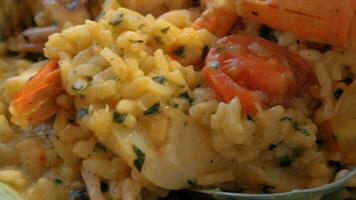 Squid and shrimp risotto dish video