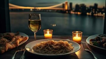 A plate of pasta and wine on a table with a view of the water and a bridge in the background with candles and a glass of wine. Generative AI photo