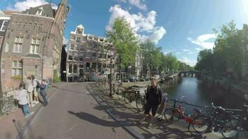 360 degree view of Amsterdam with Armbrug and canal, Netherlands video