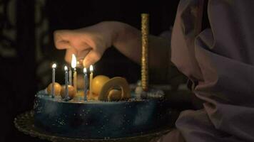 Lighting the candles on birthday cake video