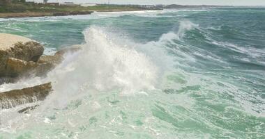 Rosh Hanikra coastline and sea waves crushing rocks video