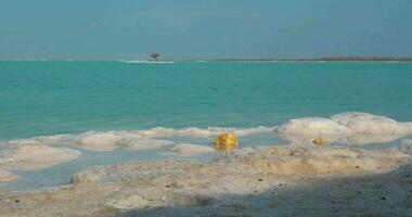 Dead Sea skyline scene with salty beach and islets, Israel video