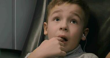 Child watching cartoons during train travel video