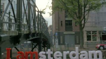 Amsterdam slogan on city view background video