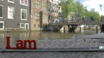 I amsterdam slogan and city view in background, Netherlands video