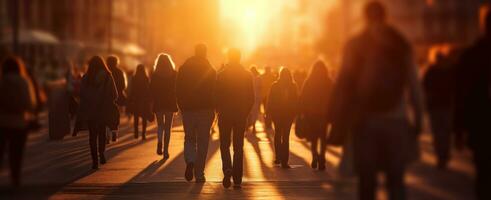 A group of people walking in a city evening photo