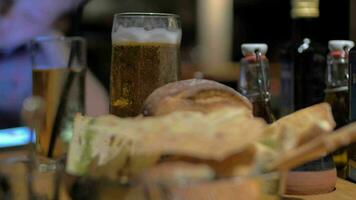 Beer and bread in cafe video