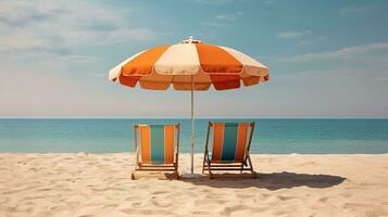 two lawn chairs under an umbrella on a beach photo