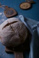 Freshly prepared and cut bread served at the table with seeds. photo