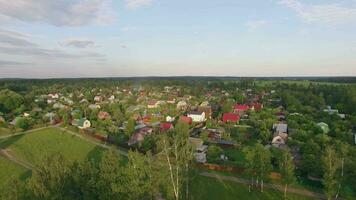Aerial shot of village, highway and green nature in Russia video