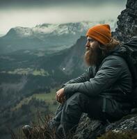 A mountain man looks out over a valley stock video, wanderlust travel stock images, travel stock photos wanderlust
