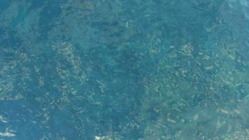 Aerial view of clear blue water in lagoon video