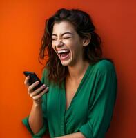 A beautiful woman laughing and tapping on her cell phone while a green background, modern aging stock images, ai generated aging images photo