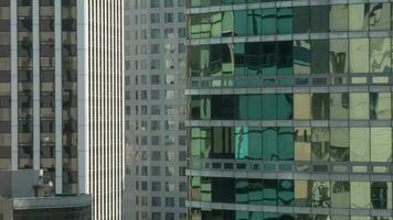 Timelapse close up view of part of skyscrapers, mirror rank of windows video