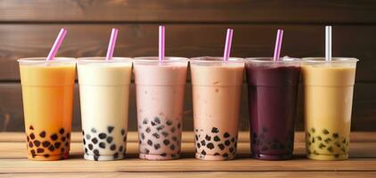 Plastic cups of different tasty bubble tea on wooden background. Generative AI photo