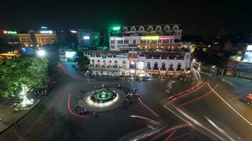 Timelapse of traffic on central square in night Hanoi, Vietnam video