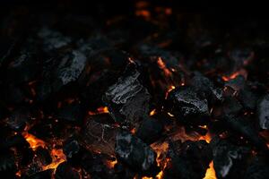 A close-up of a pile of coals on a black background, Generative AI photo