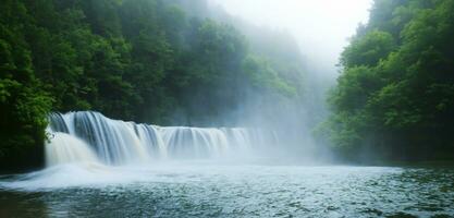 waterfall background Streams in nature waterfalls on the hills full of large trees and water spray photo