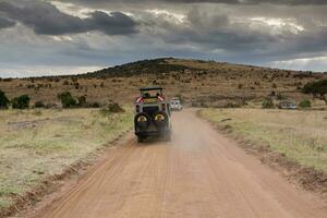 Jeep safari in Maasai Mara National Park Kenya photo