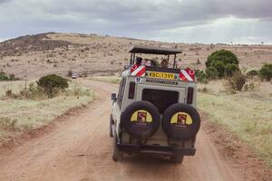 Jeep safari in Maasai Mara National Park Kenya photo