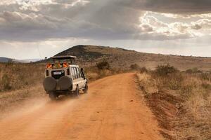 Jeep safari in Maasai Mara National Park Kenya photo