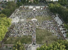 An aerial photo of Muslim congregation praying Eid in the field