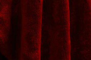 The man in the red robe shone through the light. Use it as a background for a product display or a model. photo