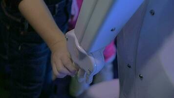 Child holding robot hand Friendly robotics video