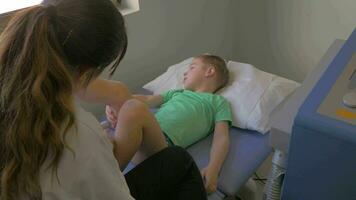 Child taking physiotherapy session video